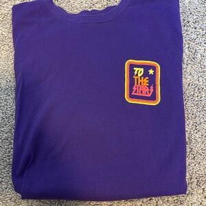 Purple Shirt with 'To The Stars' Design by Tom DeLonge